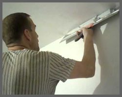 Шпатлевание потолка